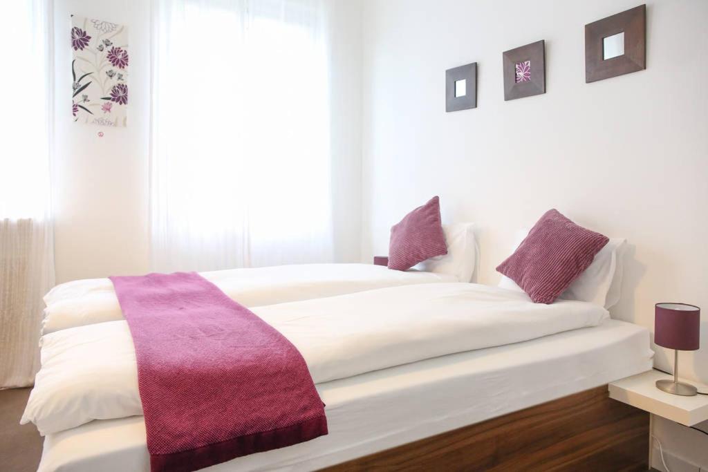 Posteľ alebo postele v izbe v ubytovaní White Villa