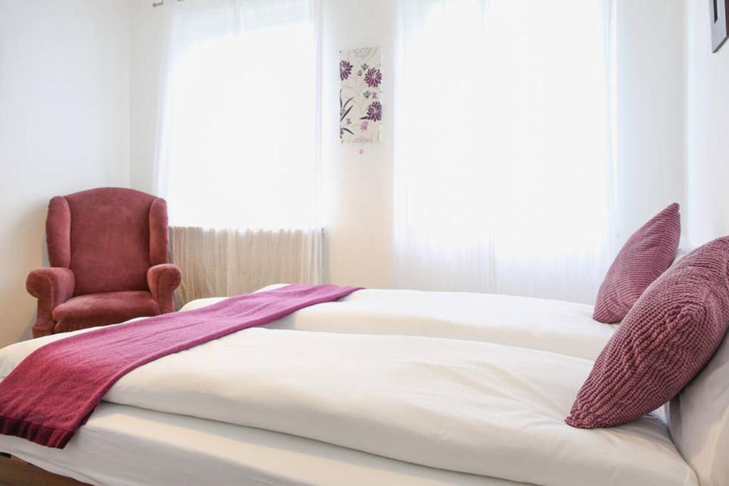Posteľ alebo postele v izbe v ubytovaní White Villa
