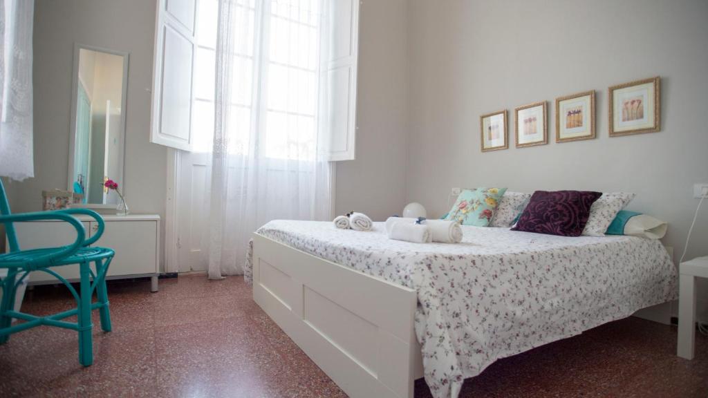 Postel nebo postele na pokoji v ubytování Casa Kilig