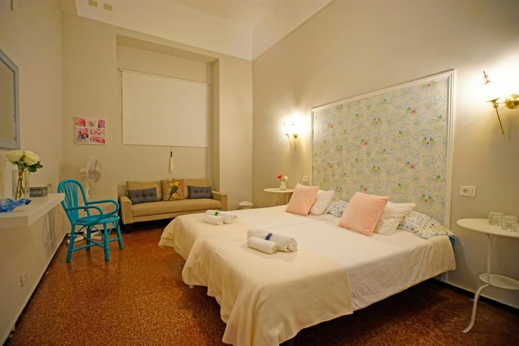 Postel nebo postele na pokoji v ubytování Casa Kilig
