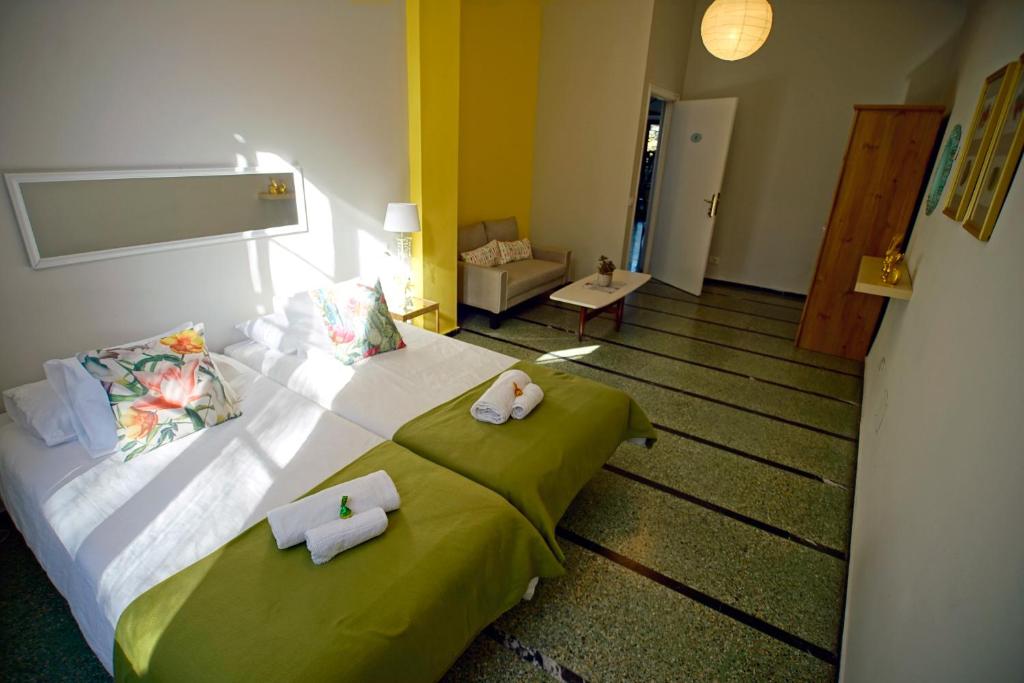 Postel nebo postele na pokoji v ubytování Casa Kilig