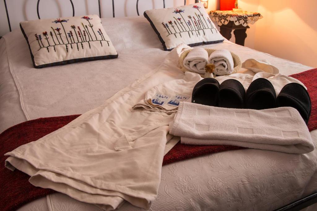 Postel nebo postele na pokoji v ubytování B&B Lercari
