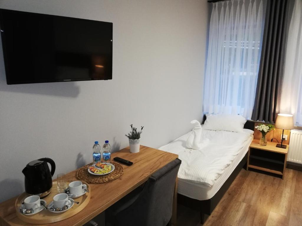 Postel nebo postele na pokoji v ubytování Jurajska Przystań