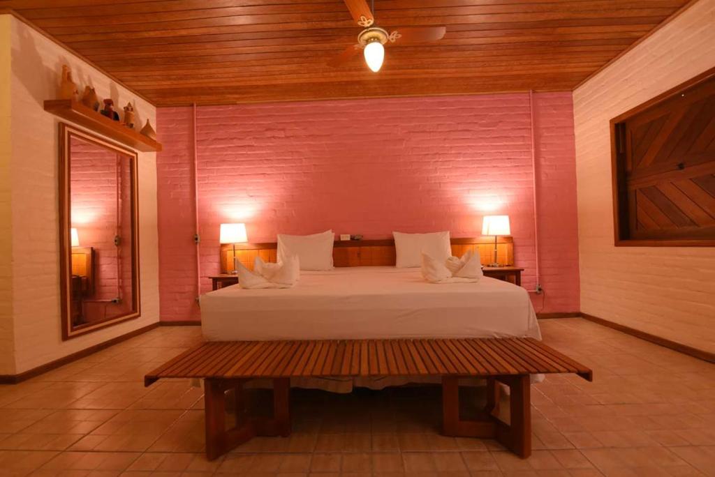 Postel nebo postele na pokoji v ubytování Porto Preguiças Resort