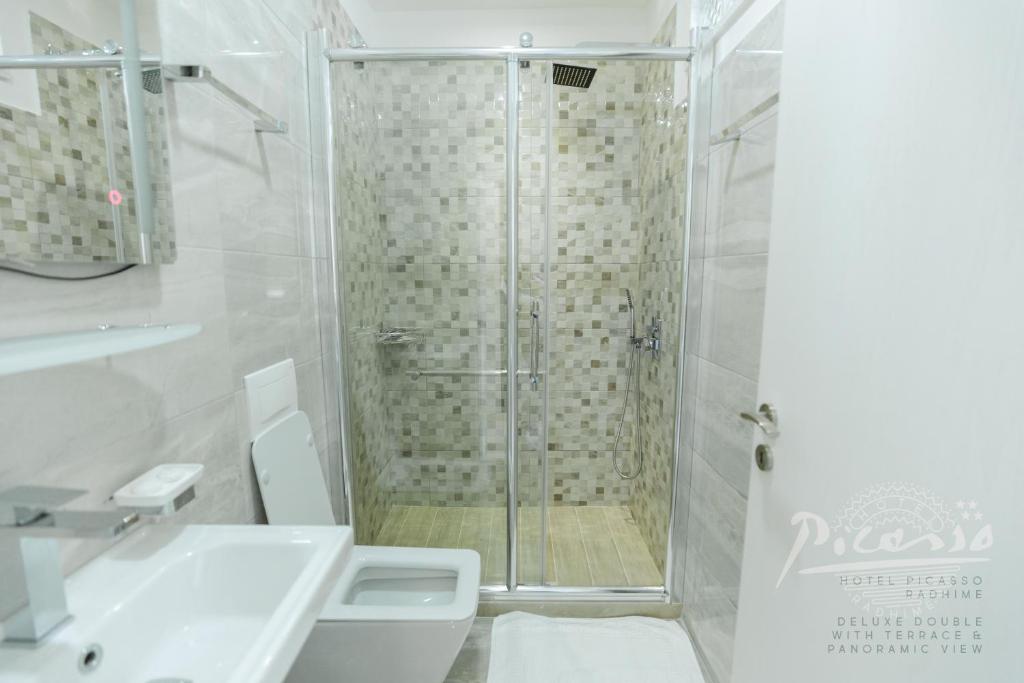Koupelna v ubytování Hotel Picasso