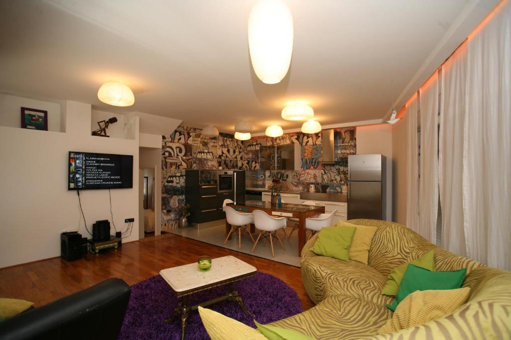 Kuchyň nebo kuchyňský kout v ubytování Domus Apartments