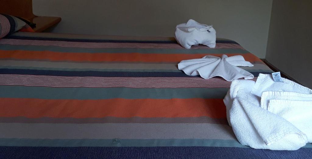 Postel nebo postele na pokoji v ubytování Axkan Arte Hotel