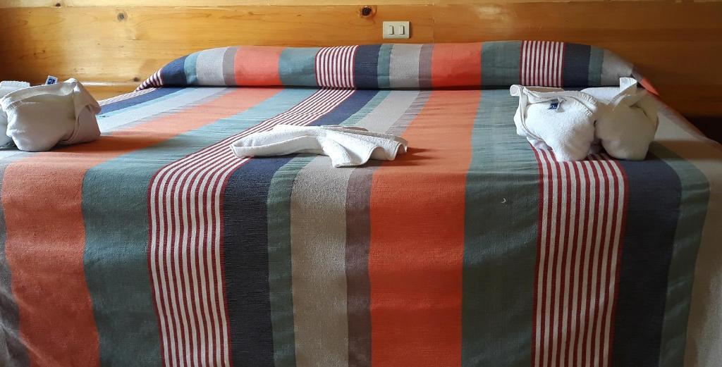 Postel nebo postele na pokoji v ubytování Axkan Arte Hotel