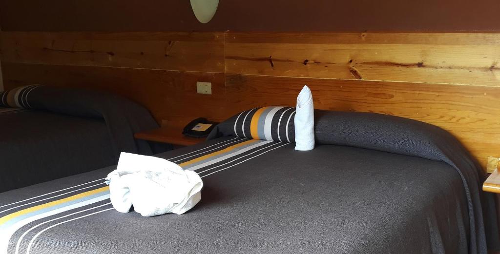 Postel nebo postele na pokoji v ubytování Axkan Arte Hotel