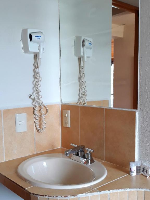 Koupelna v ubytování Axkan Arte Hotel
