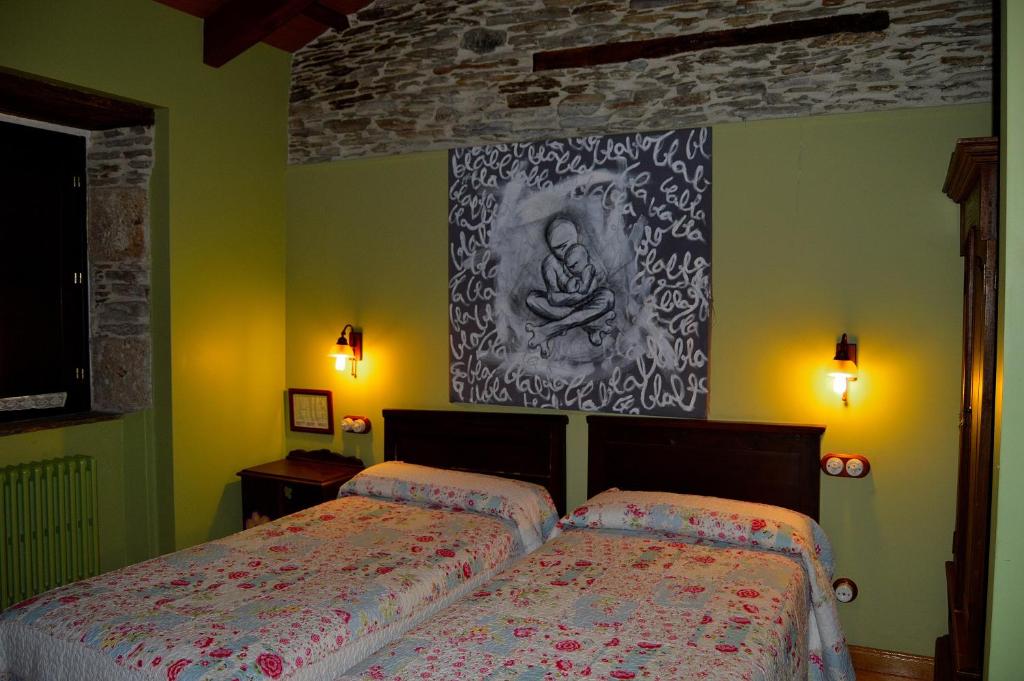 Postel nebo postele na pokoji v ubytování Casa de Baixo