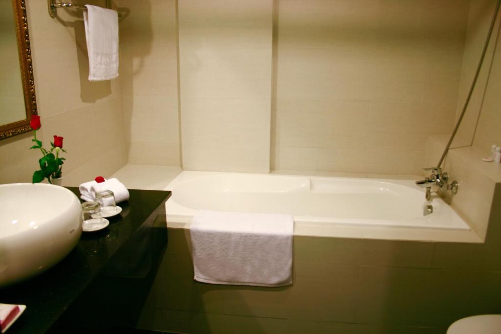 Koupelna v ubytování Angella Hotel