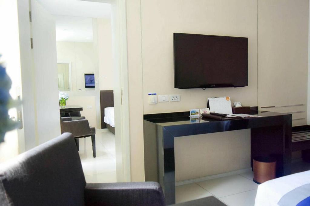 TV a/nebo společenská místnost v ubytování Mandarin Hotel Managed by Centre Point