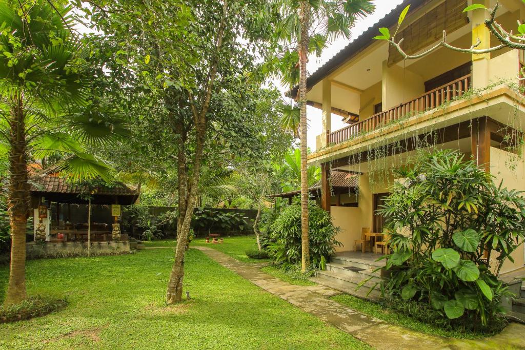 Zahrada ubytování Manggis Sari Guesthouse