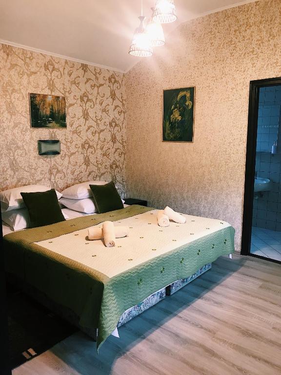 Postel nebo postele na pokoji v ubytování Altan Apartments