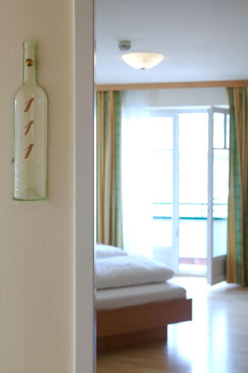 Postel nebo postele na pokoji v ubytování Hotel Neustifter
