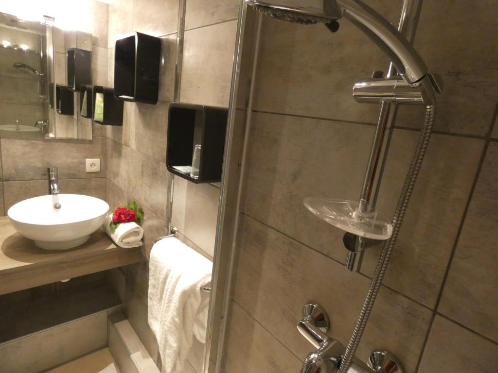 Koupelna v ubytování Hôtel Du Midi