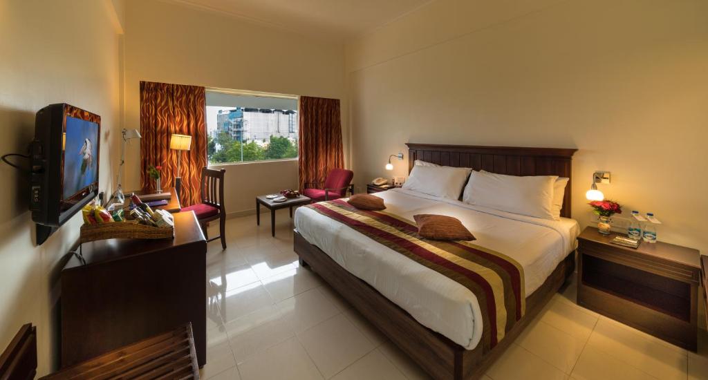 Postel nebo postele na pokoji v ubytování Fortune Pandiyan Hotel, Madurai - Member ITC Hotels' Group