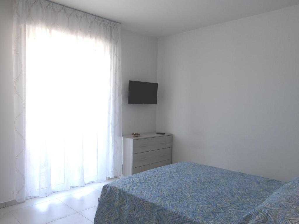 Posteľ alebo postele v izbe v ubytovaní Relax al mare