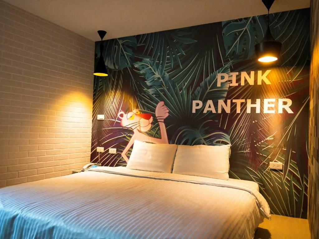 Postel nebo postele na pokoji v ubytování S&E Hotel