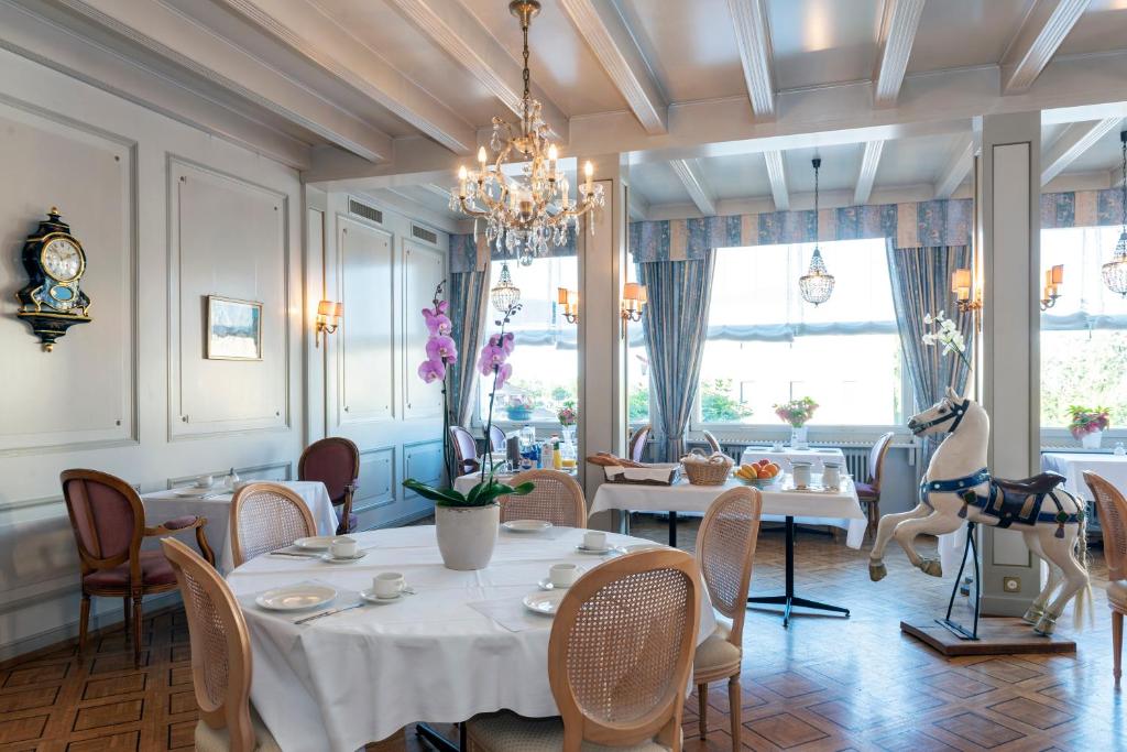 Posezení v ubytování Hôtel du Cheval-Blanc