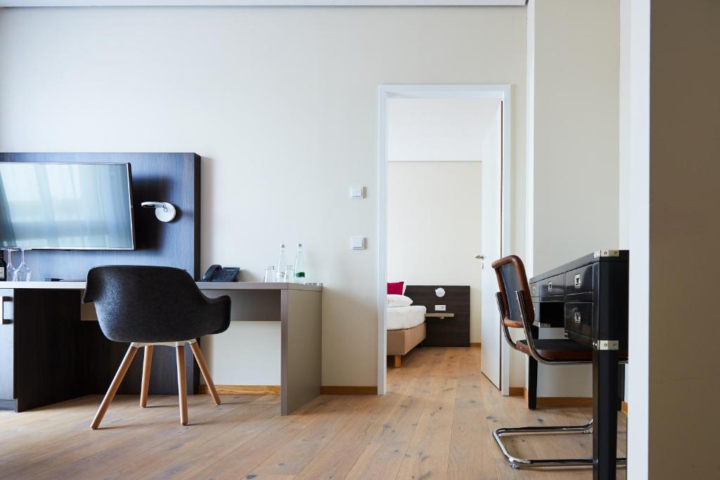 TV a/nebo společenská místnost v ubytování Hotel Calamus - 4 Sterne Superior