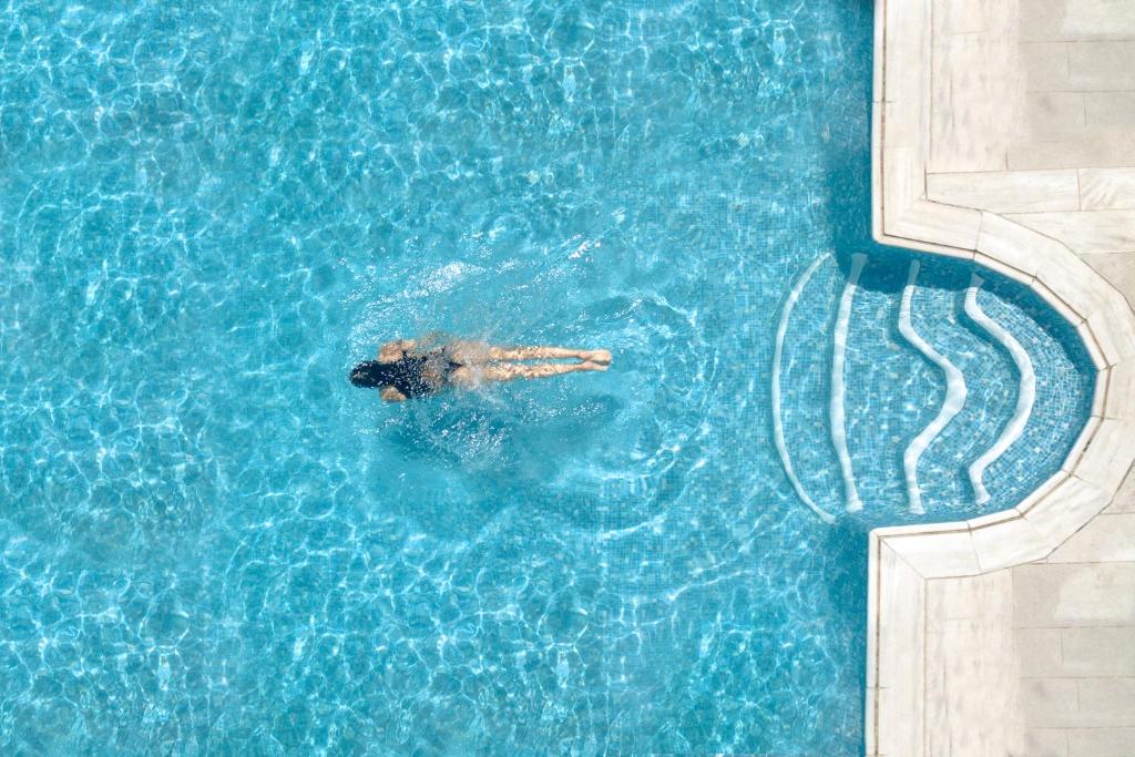 Bazén v ubytování Harmony Boutique Hotel nebo v jeho okolí