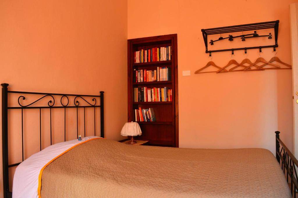 A bed or beds in a room at Il Giardino Nel Parco R&B