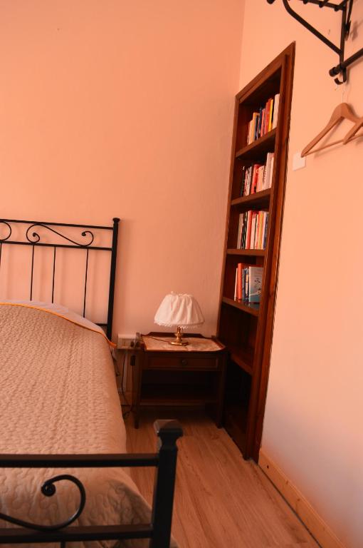 A bed or beds in a room at Il Giardino Nel Parco R&B