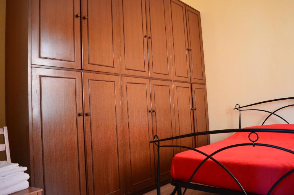 A bed or beds in a room at Il Giardino Nel Parco R&B