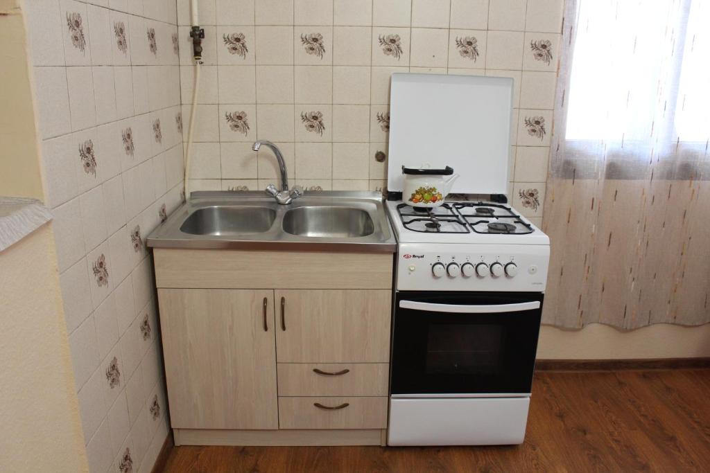 Kuchyň nebo kuchyňský kout v ubytování Guest House Stefanos