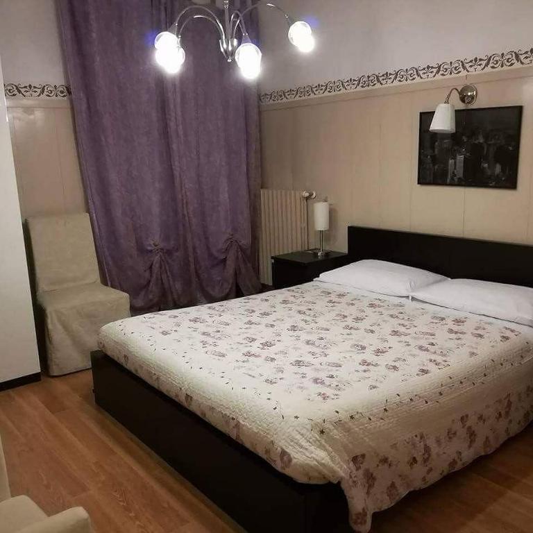 Posteľ alebo postele v izbe v ubytovaní B&B L'Isola di Casa