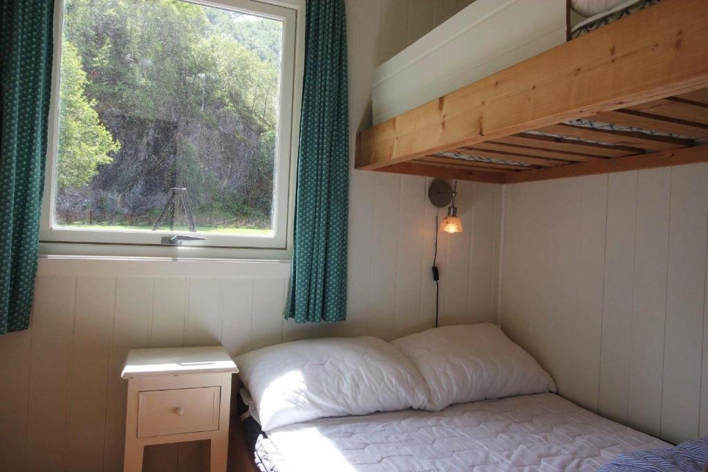 Postel nebo postele na pokoji v ubytování Trollstigen Resort