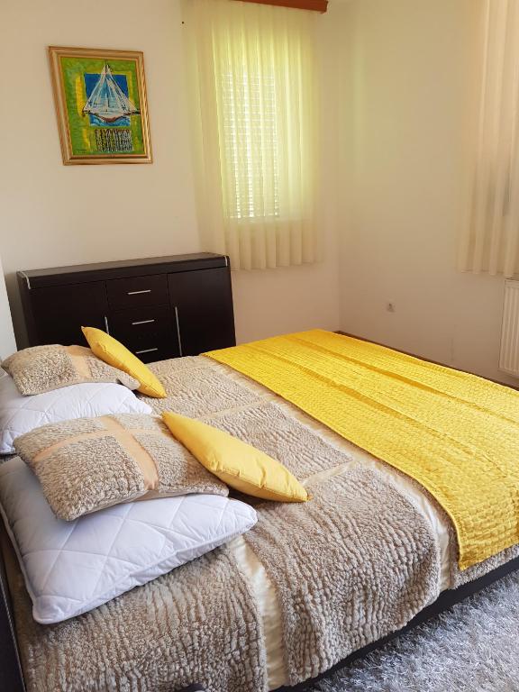 Postel nebo postele na pokoji v ubytování Rooms Leda