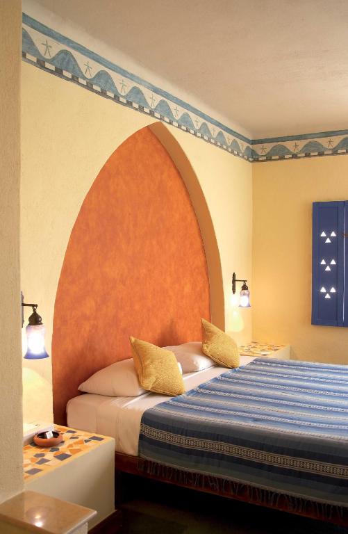 Postel nebo postele na pokoji v ubytování Marina Lodge at Port Ghalib