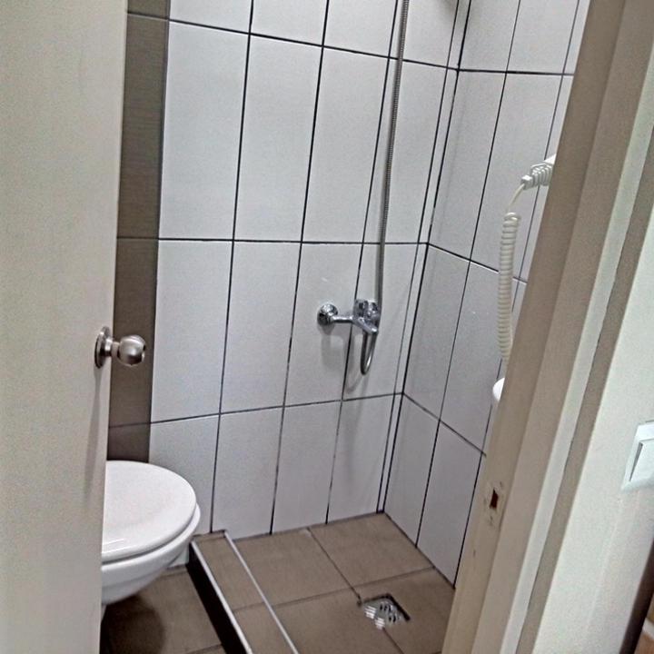 A bathroom at Rich Melissa Hotel