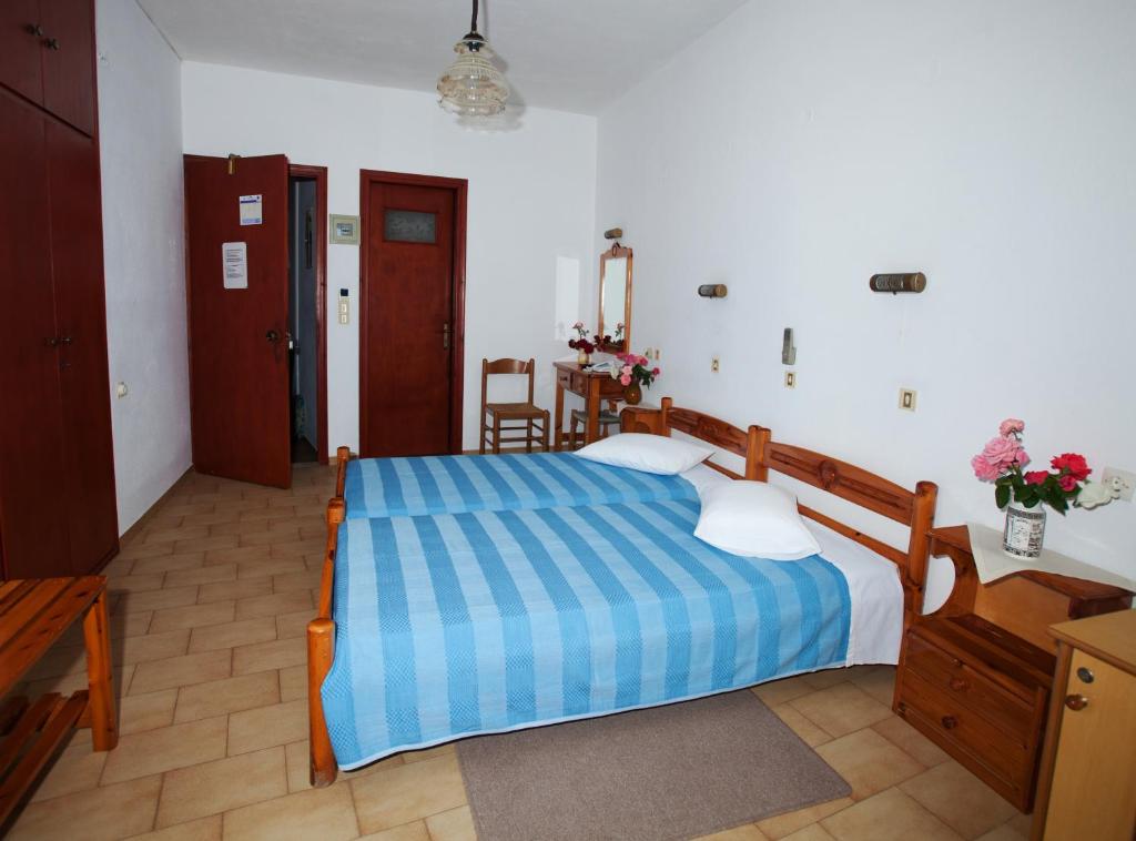 Postel nebo postele na pokoji v ubytování Casteli Hotel