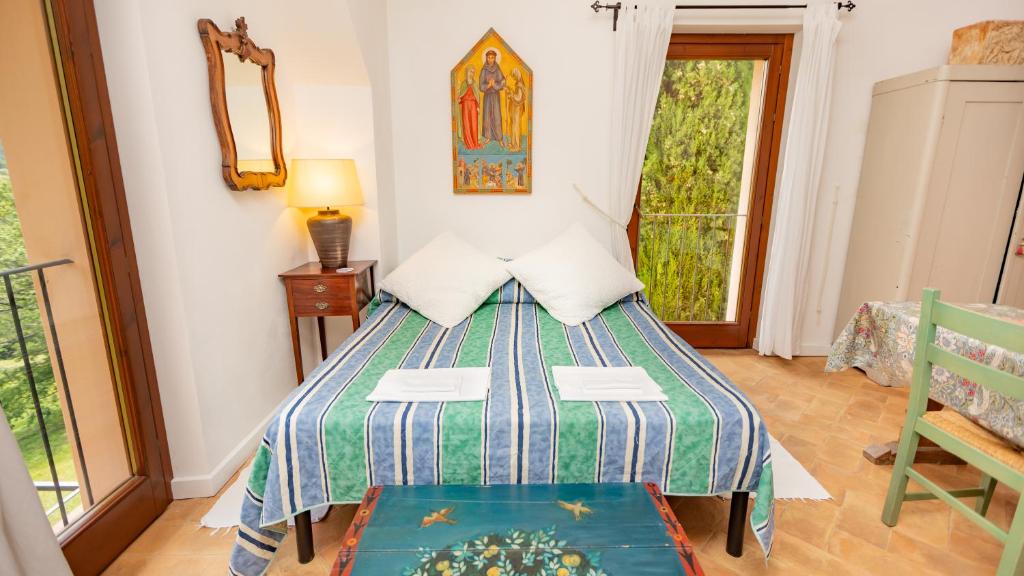 Postel nebo postele na pokoji v ubytování Casa Rosa