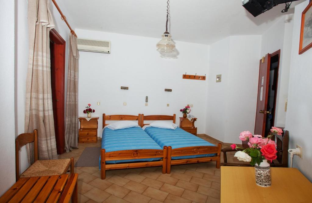 Postel nebo postele na pokoji v ubytování Casteli Hotel