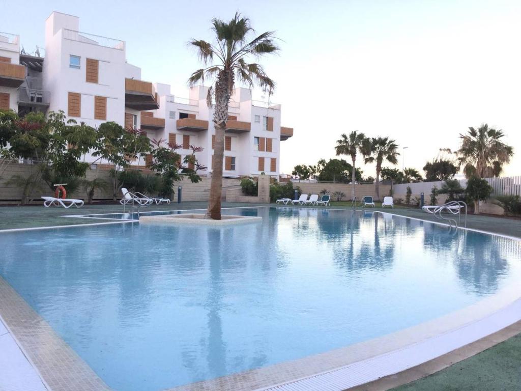 The swimming pool at or close to AMAZING DUPLEX on the beach