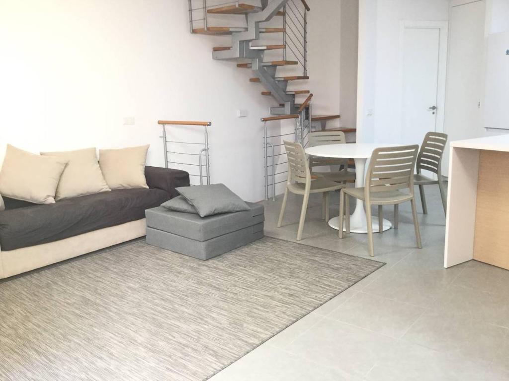 A seating area at AMAZING DUPLEX on the beach