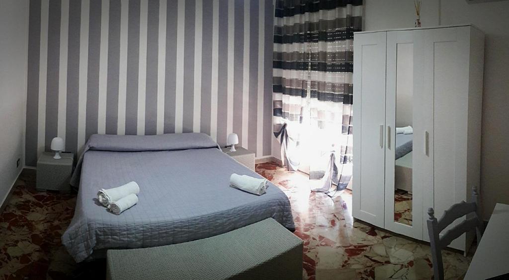 Llit o llits en una habitació de Al Civico 8 - Palermo