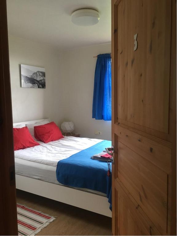 Postel nebo postele na pokoji v ubytování Dynjandi Guesthouse