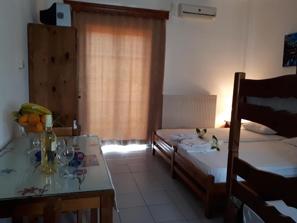 Postel nebo postele na pokoji v ubytování Pantelatos Studios