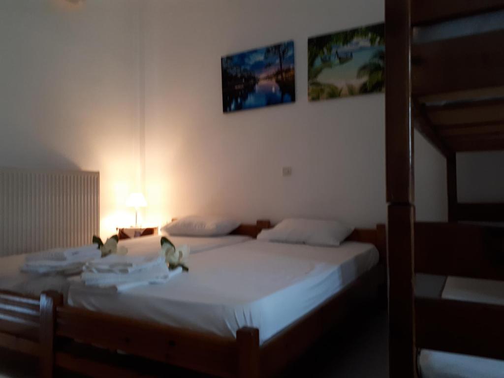 Postel nebo postele na pokoji v ubytování Pantelatos Studios
