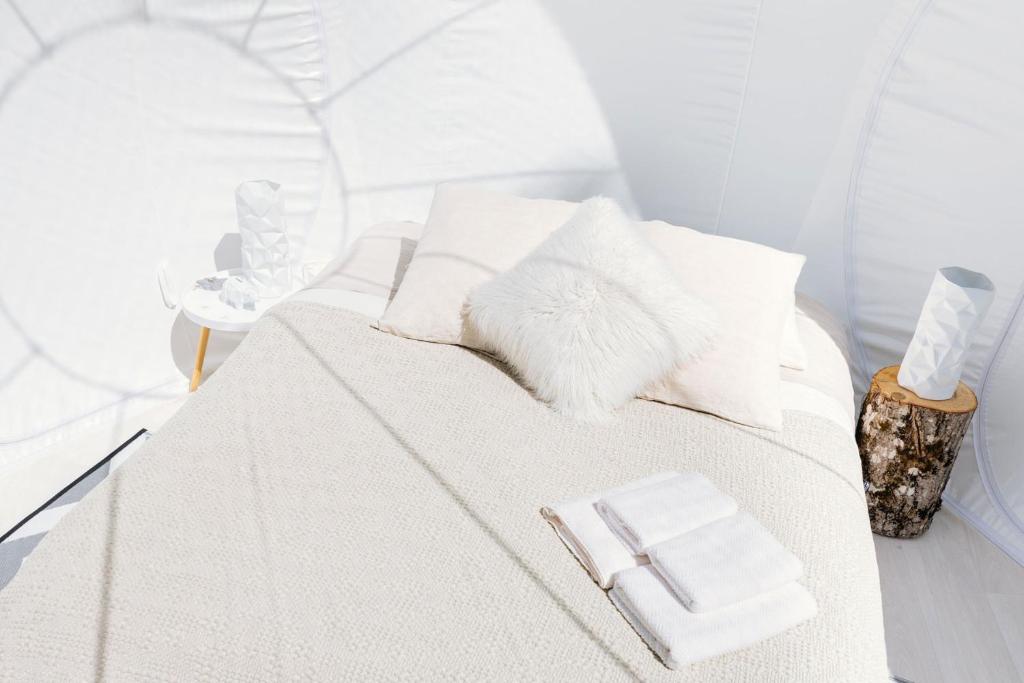 Tempat tidur dalam kamar di Somn'en Bulle