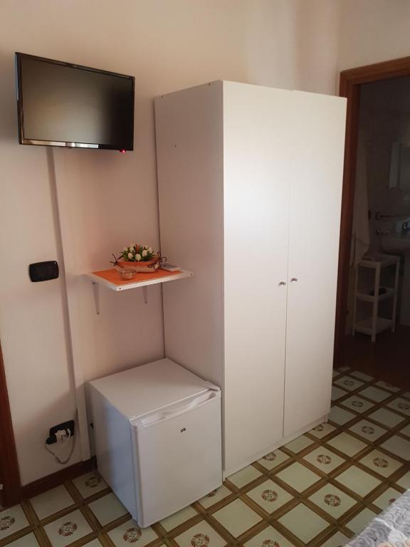 TV a/nebo společenská místnost v ubytování B&B Dolce Casa