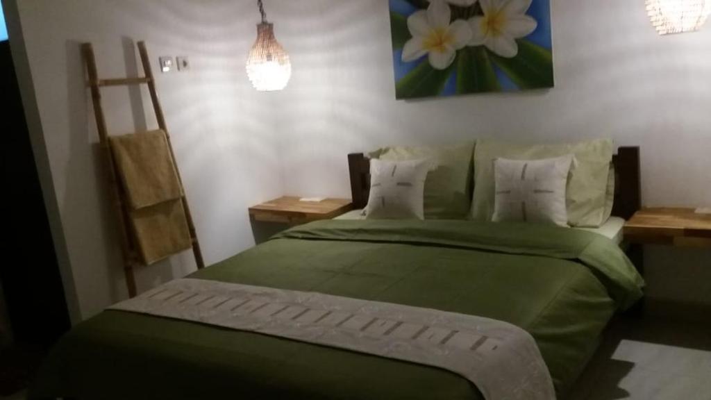 Postel nebo postele na pokoji v ubytování Cape Rose