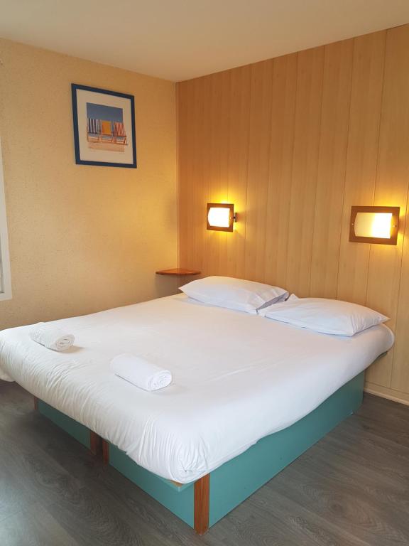 Postel nebo postele na pokoji v ubytování Fasthotel Carcassonne
