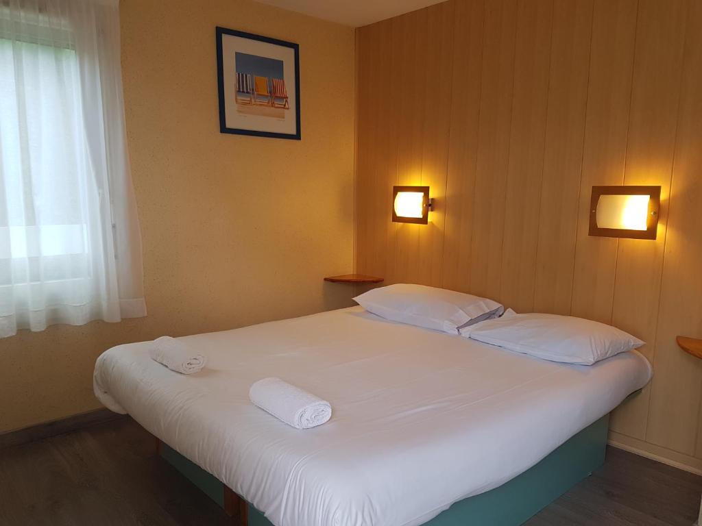 Postel nebo postele na pokoji v ubytování Fasthotel Carcassonne